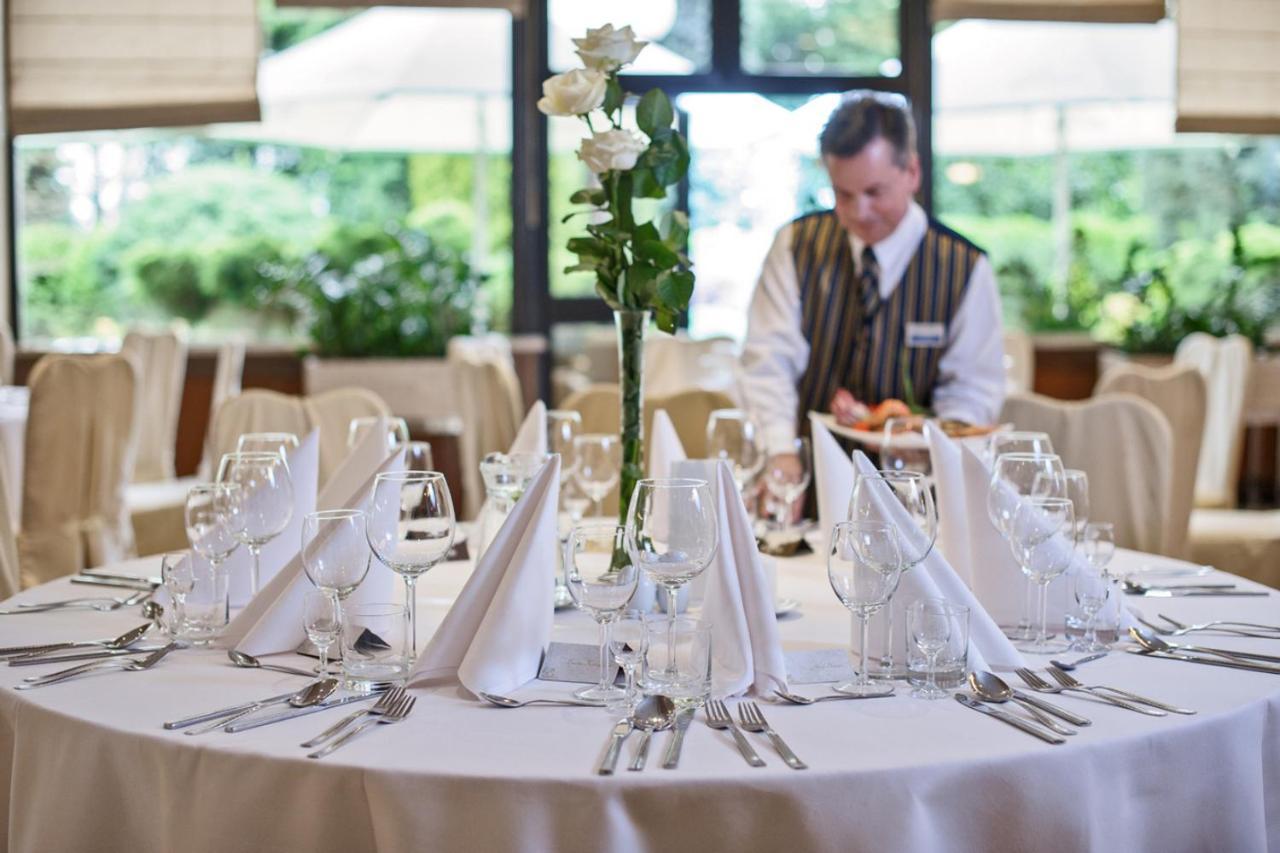 Booking Hotel & Spa Krakow Exterior photo A table set for a formal dinner